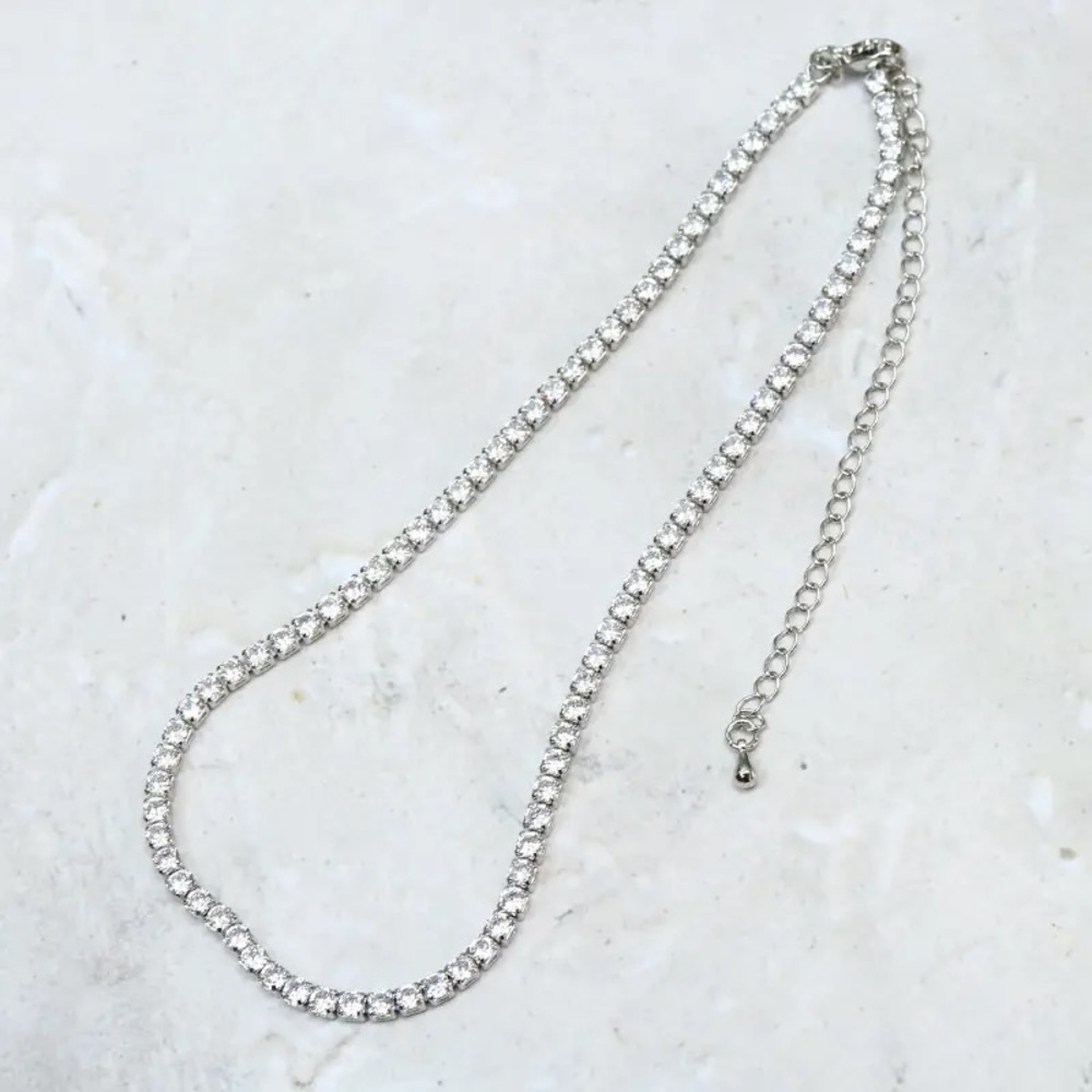 Brand new Anthropologie tennis necklace. Gold and silver color.
